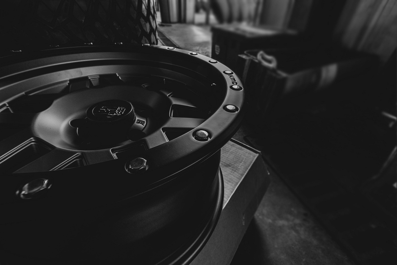 Black and white close-up of an alloy wheel